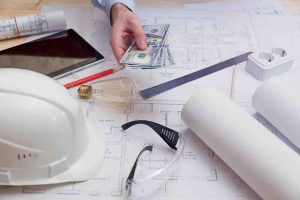man pays for engineering, construction and installation services